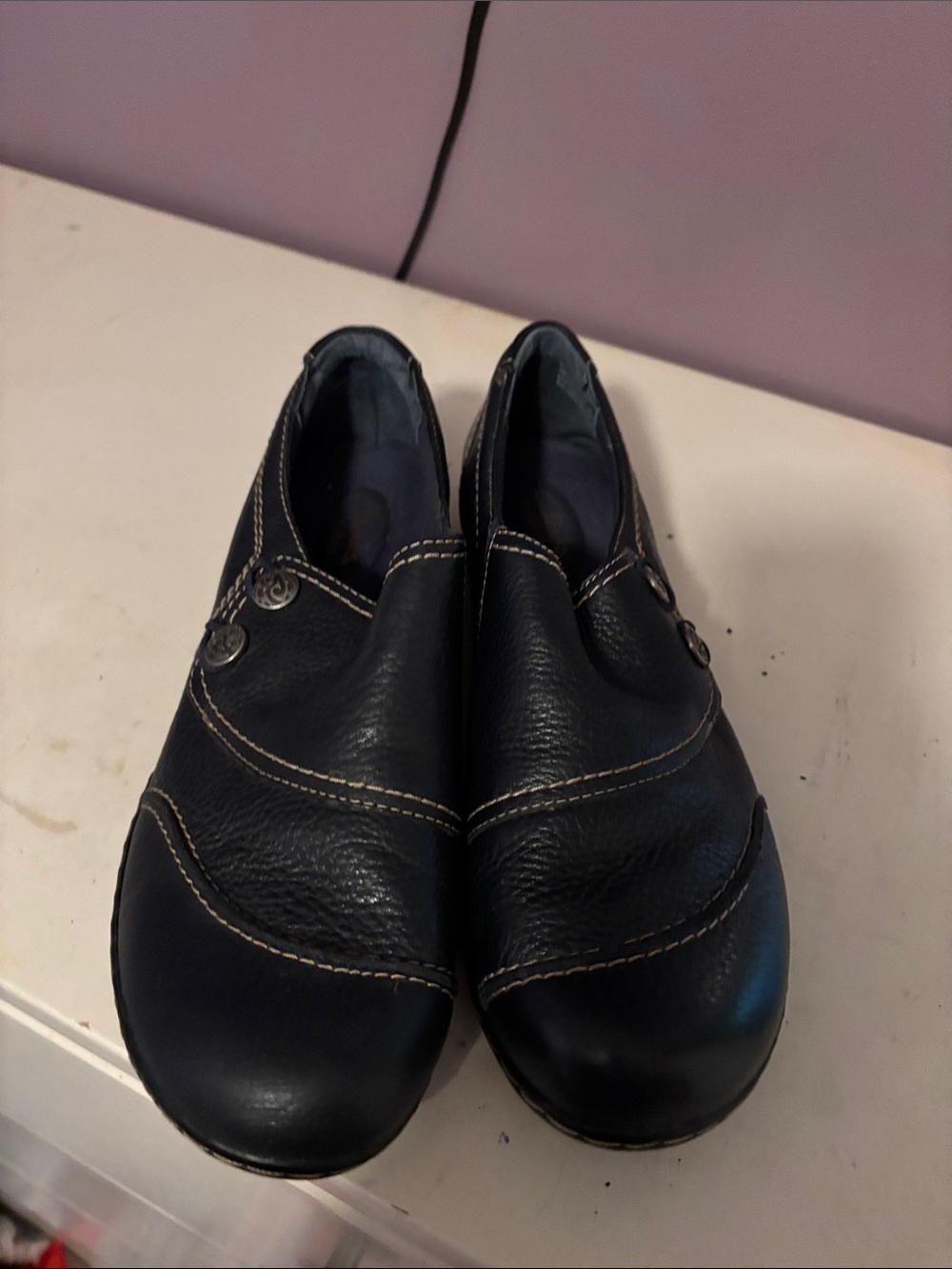 Clark’s Black Leather Slip-On Loafers with Contrast Stitching
